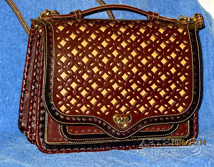 Woman handbag
Genuine leather
Handmade leather handbags
Erofey Evladin
